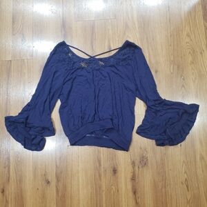 About A Girl Navy Blouse with Ruffle Sleeves and Lace Detail!